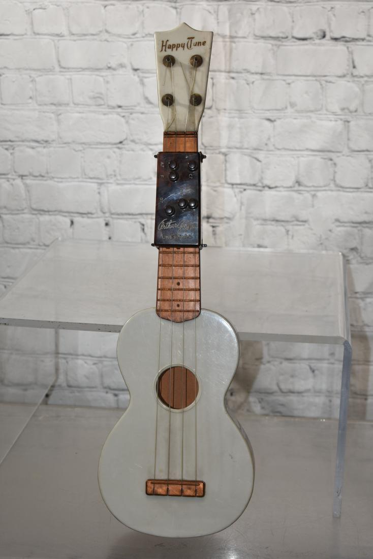Vintage "Happy Tune" Plastic Ukulele (1 of 6)