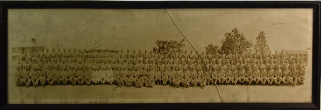 WWII Camp Lee Yard Long Photograph: Exposed area measures approx. 9 1/2"h x 31"w. It is titled "Company B 6th Medical Training Battalion Camp Lee, Va. Sept, 23, 1941". Note: Item has cracked glass.