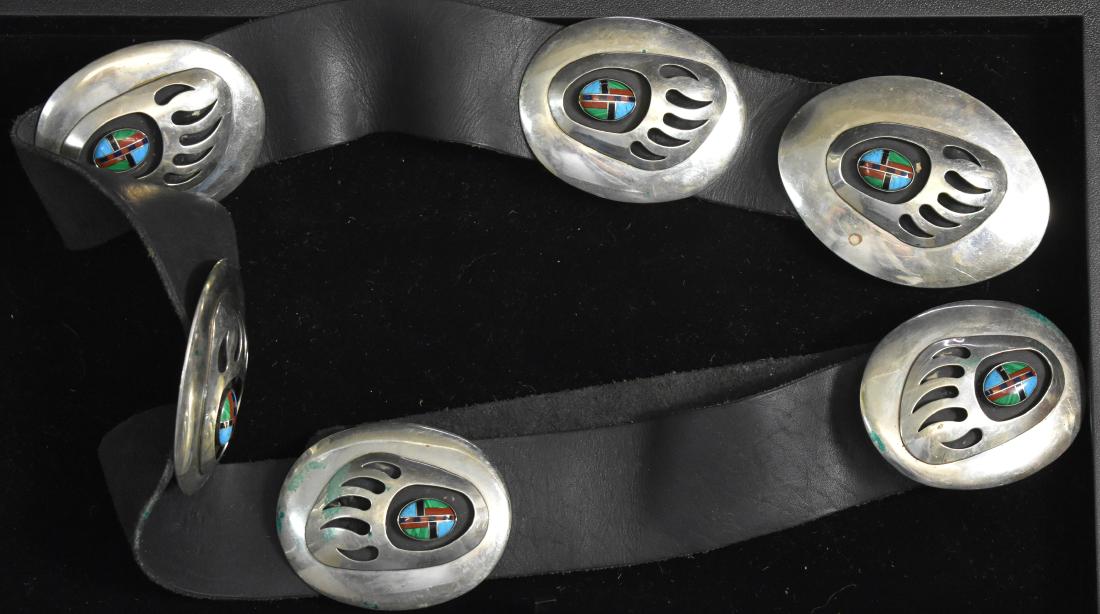 Vintage Native American Bear Claw Belt: Belt measures approx. 42" long. It has six bear claws including the buckle all inlaid with turquoise and malachite.