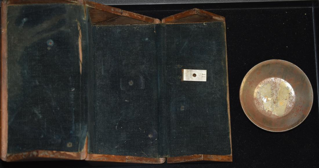 Mini Gold Rush Pan & a Singer Box: The gold rush pan measures 3"dia and reads "Nome, Alaska Gold Rush 1898" and contains two tiny gold nuggets under tape. Lot also includes a Singer sewing machine box with a velvet lining patented 1889