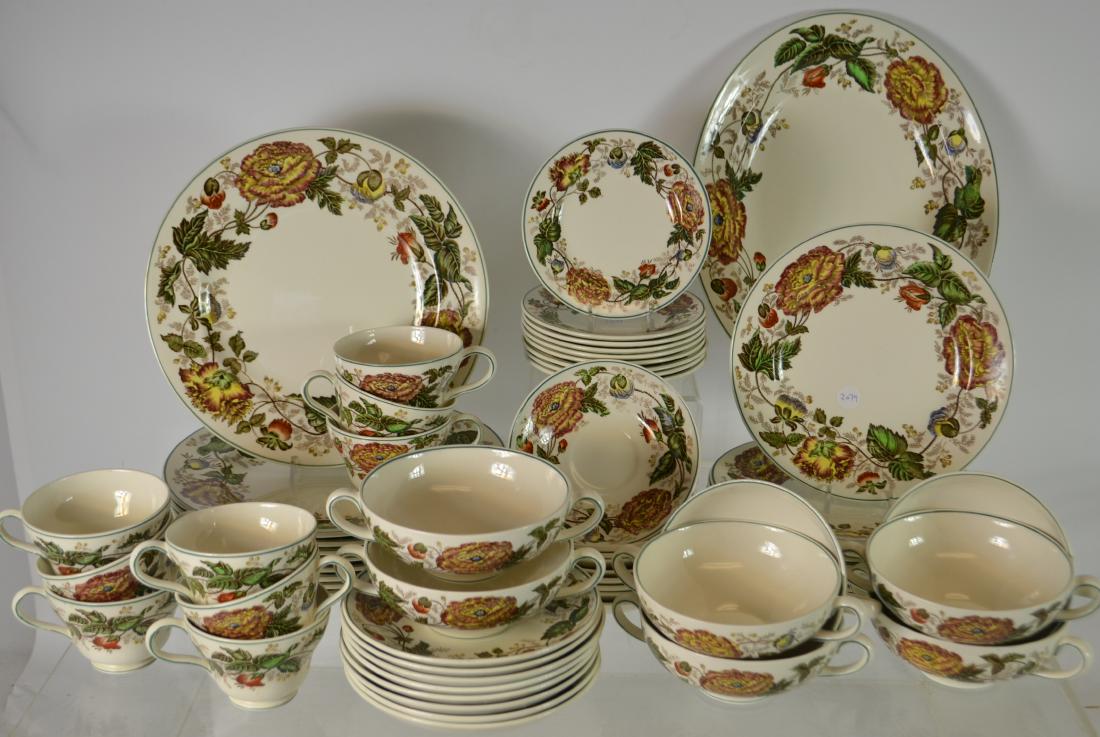 Wedgewood Partial Dining Service: Wedgewood partial dining service including nine 10.5" dinner plates, six cream soups with saucers, nine cups and saucers, and nine 8.5" salad plates, and nine 5.75" B&B plates and a 13" oval platter -
