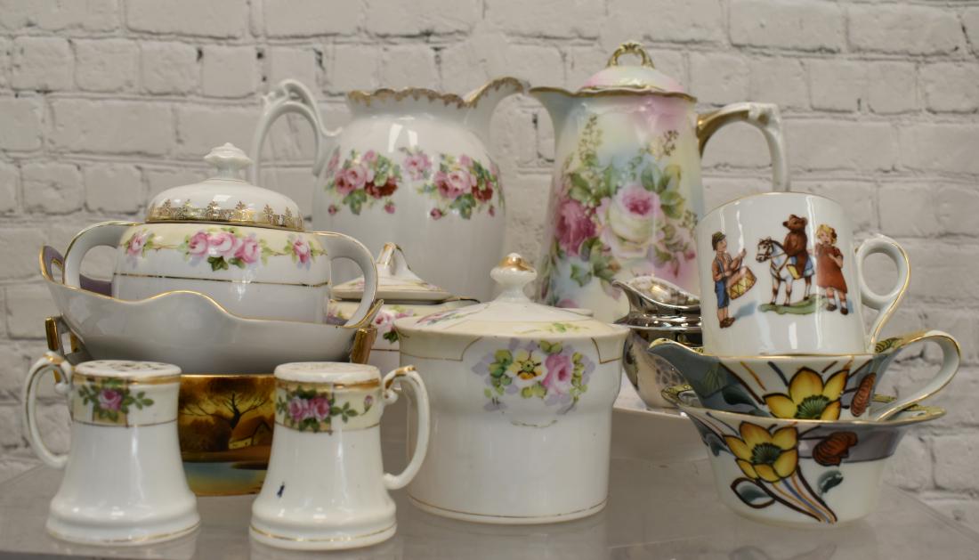 Mixed China Grouping: Including various hand painted Nippon items, two pieces of Noritake "Tree in the Meadow" and two chocolate pots - one with a hairline.