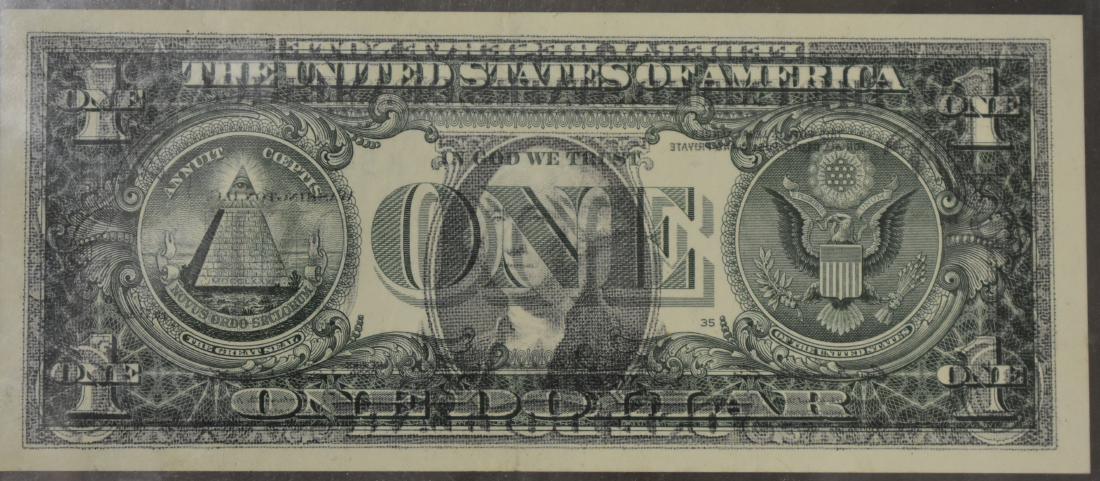 Dollar Bill with an Error: Item is a 2009 United States dollar bill with printing of George Washington on front and back, It is professionally framed for two sided viewing.