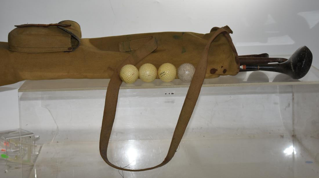 Vintage Golfing items: Including four hickory shaft golf clubs - one is bent, an aluminum driver, four vintage round dimpled golf balls - two are Billy Casper and a selection of contemporary golf tees.