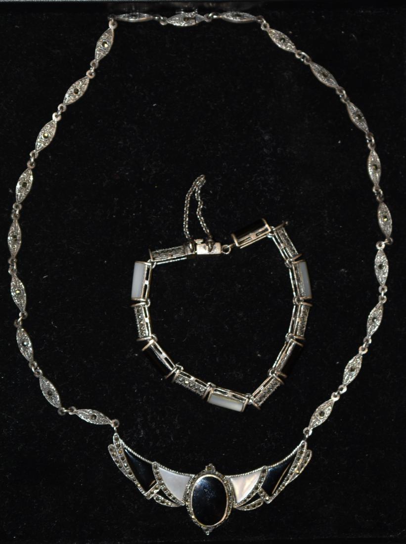 Vintage Sterling Necklace and Bracelet: Item is a matching set in an Art Deco style with marcasite, onyx and mother of pearl inlay.