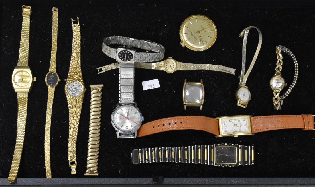 Grouping of Watches: Including an "Ever Swiss" pocket watch, a men's Caravelle wrist watch, a lady's Wittnauer marked "Swiss", a lady's "Jules Jurgensen" watch and other watches and bands.
