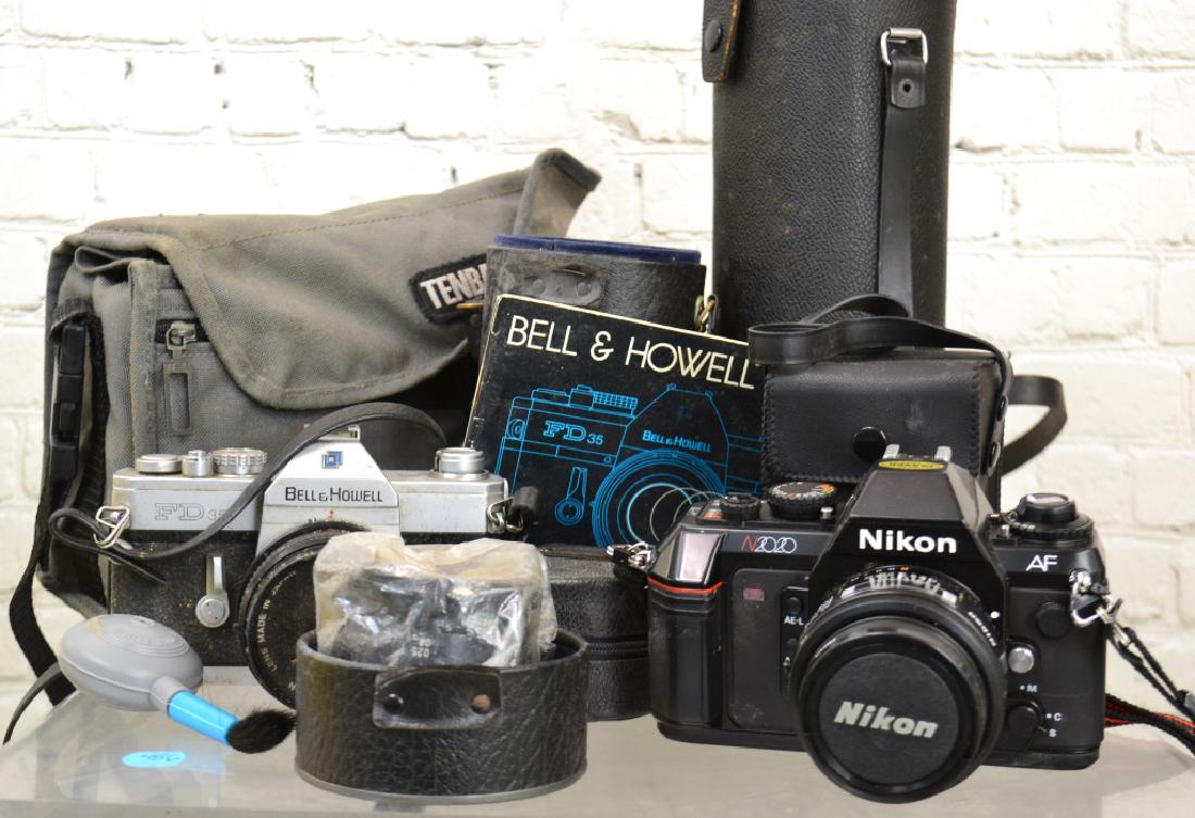 35mm Cameras and Lens: Includes a Bell and Howell FD 35mm camera, a Nikon N2020 35mm camera, a Solinger telephoto lens model#H68741 and various other lens.