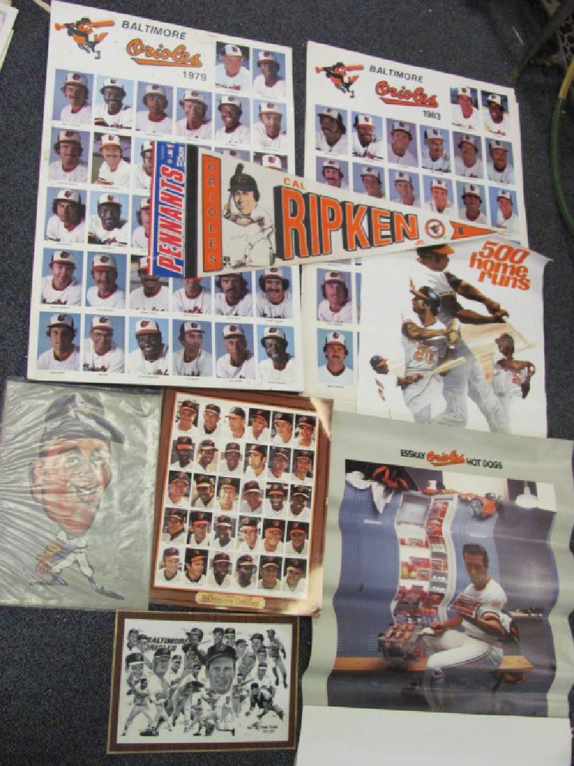 Large Baltimore Orioles Ephemera Grouping: 12 Pieces including 1971, 1979 and 5 1983 team player photo posters, Cal Ripken Jr. mid 1980's Esskay Poster (wrinkled), Frank Robinson 500 HR's Poster (tear bottom right), Tasco Dave McNally color ca