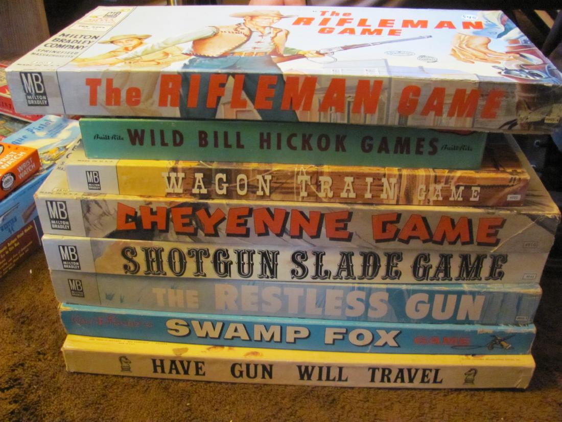 Vintage Board Game (8): Appear to be complete, many Milton Bradley, circa 1950s/1960s including Cheyenee, Have Gun Will Travel, Shotgun Slade, The Restless Gun, Swamp Fox, Wild Bill Hikock, Wagon Train, and The Rifleman.