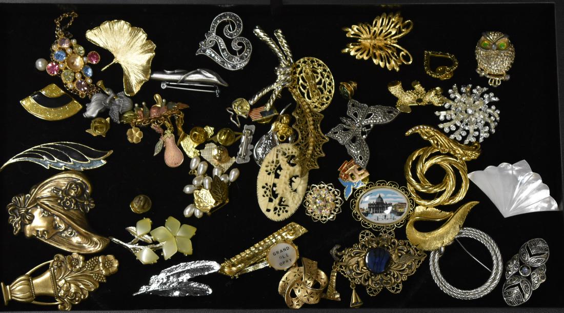 Figural and other Pins: Including a Sarah Coventry owl pin, a bear pin, a Monet butterfly pin, pins with rhinestones and other quality items.