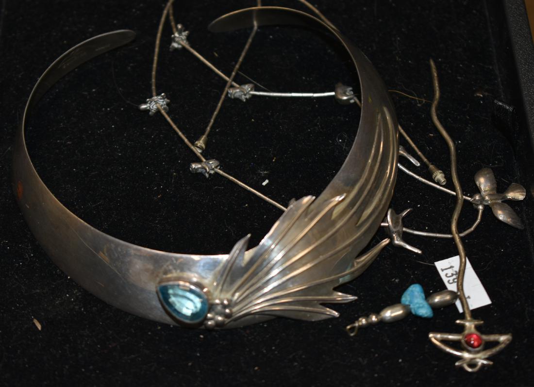 Sterling Jewelry Grouping: Including a large sterling choker with a blue stone, a sterling necklace with native animal figures and a sterling hat pin with a round red stone.