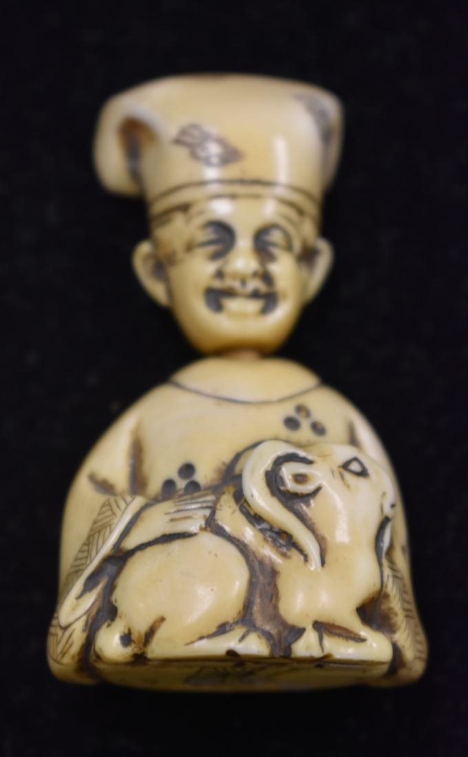 Vintage Hand Carved Netsuke Nodder with Goat: Item measures 2 1/2" h .It depicts a man petting a goat. It is a two piece item. It is finely detailed and has a two character signature on back. From a private collection that was procured between 19