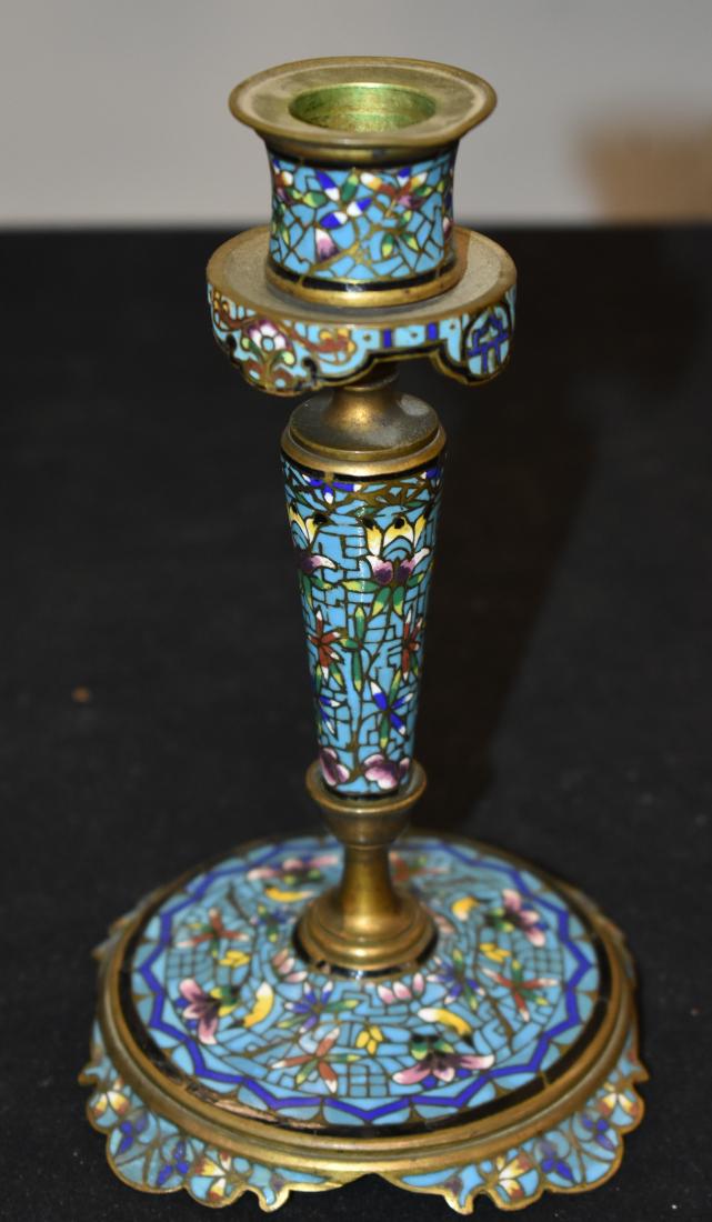 Early 20th Century French Champleve Candlestick: Item measures approx. 7"h It has a brass and champleve body with lotus and other flowers.