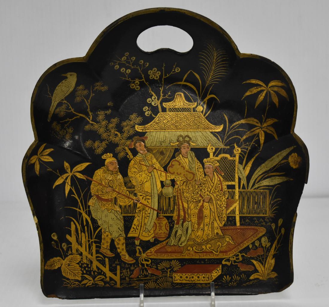 19th Century Japanned Black Crumb Tray: Item measures approx. 10"h x 10 1/2"w. It is paper mache construction. It depicts a royal exterior scene. Item has a gold and red painted surface over a Japanned black surface and shows common loss al