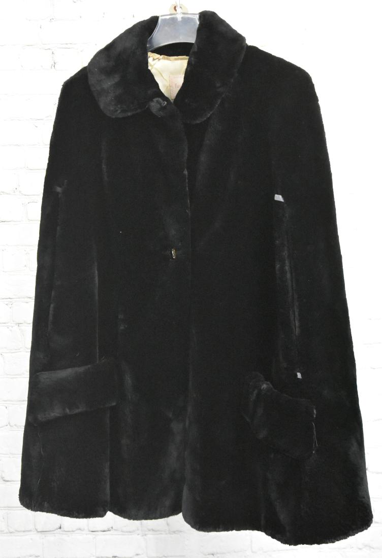 Black Mink Cape: Tag reads "Furs by Richard York, Pa". It has a monogrammed interior and has no visible flaws.