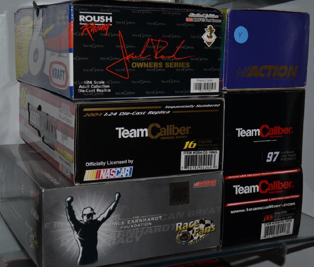 6 Die Cast Race Cars Incl. Kurt Busch Auto.: 1998 Kenny Irwin Action Limited Edition & 2002 Mark Martin Team Caliber Limited Edition & 2004 Greg Biffle Team Caliber Limited Edition & 2004 Greg Biffle Team Caliber Limited Edition & 2003 Dale Earn