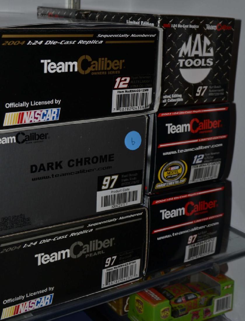 6 Die Cast Race Cars Incl. Kurt Busch Auto.: 2002 Kurt Busch Team Caliber 1 of 2,412 & 2004 Ryan Newman Team Caliber 1 of 1,100 & 2004 Kurt Busch Team Caliber 1 of 10,080 & 2004 Ryan Newman Team Caliber 1 of 5,004 Owners Series & 2003 Kurt Busch