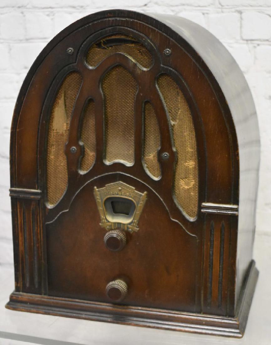 Crosley Model 148 Radio: Has a Magnum Box speaker, case has minor ware but looks good for age and tears on speaker screen, dials in good shape. was not tested by auction company. Measures 14" x 12"