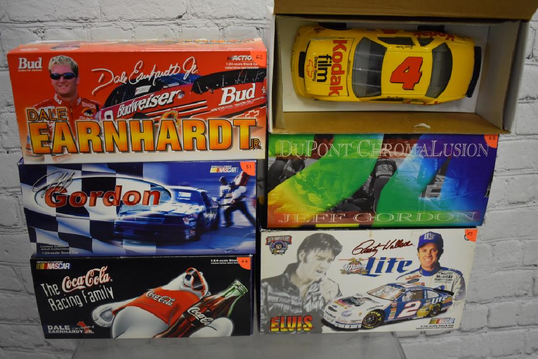 Six 1:24th Scale Die cast Cars: Including Ernie Irvin Kodak, 2 Jeff Gordon action cars, Rusty Wallace action, 2 Dale Earnhardt Jr. action cars.