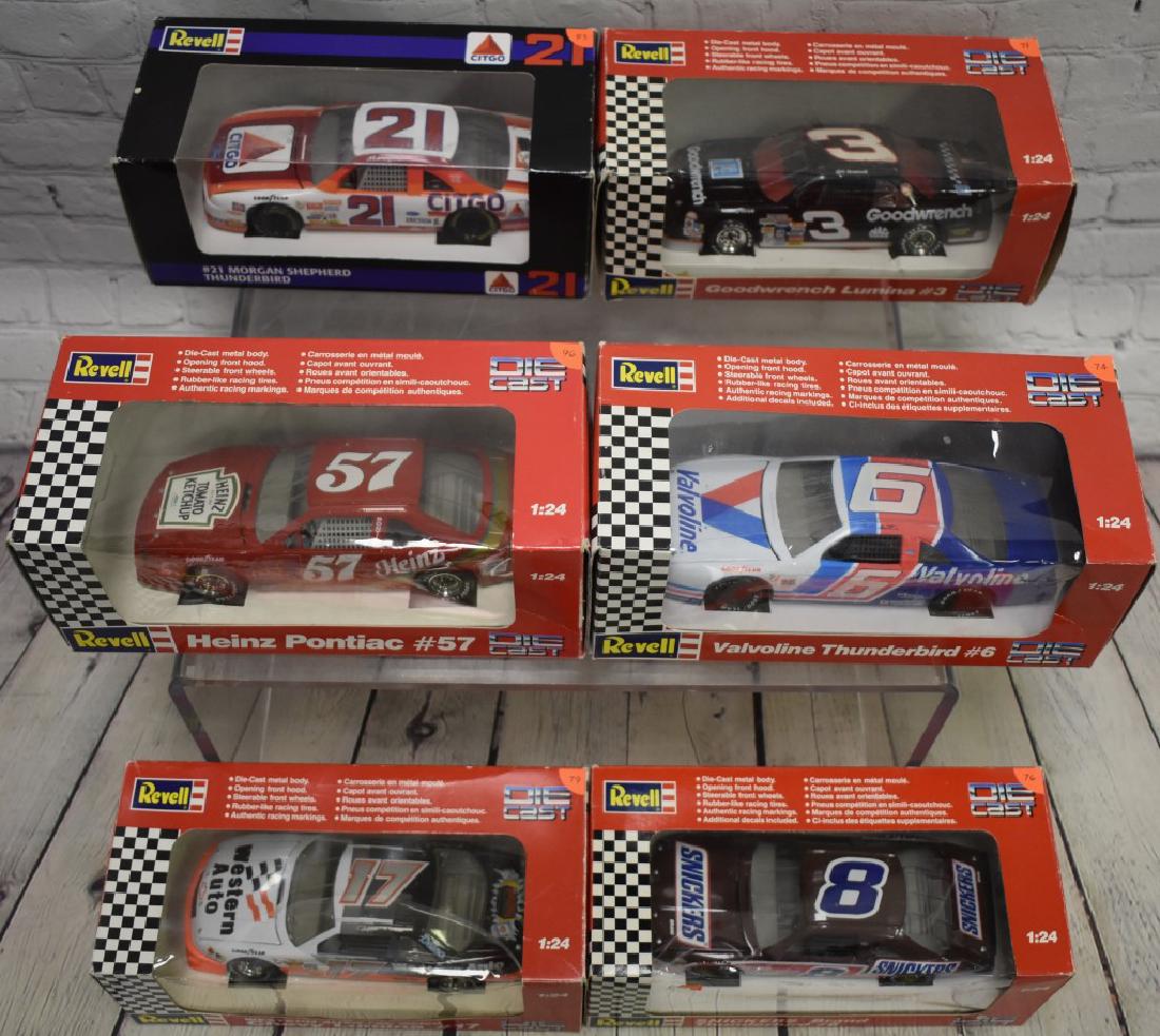 Six 1:24th Scale Die cast Revell Cars: Including Dale Earnhardt, Snickers, Morgan Shepard, Western Auto, Heinz, and Mark Martin.