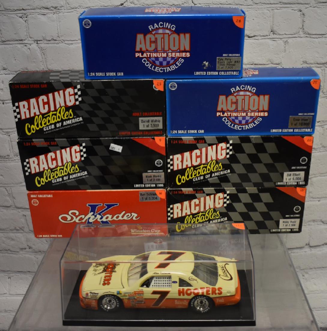 Eight 1:24th Scale Die cast Cars: Including Bill Elliot, Ricky Rudd, Mark Martin, Darrell Waltrip, Ernie Irvan, Ken Schrader, Kyle Petty, and Alan Kulwicki. Most are made by action.