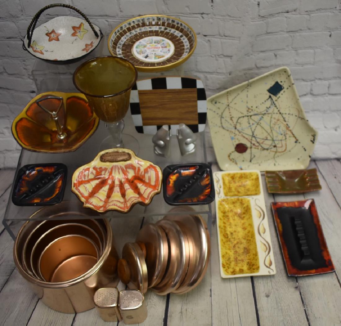 Vintage Kitchen Items: Vintage "Mirro" copper tone canister set and matching set of trays, salt and pepper and more.