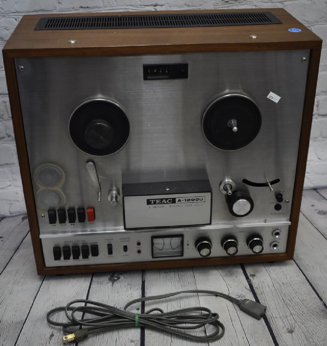 Teac A-1200U Stereo Reel-To-Reel: Features three motors is in stereo and looks to be in good condition. Auction house does not test electronics.