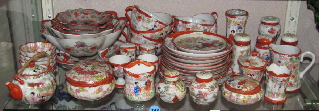Over 40 Rose Medallion Red Geisha Dishes: Including 12 scallop edge dishes in various sizes, ten saucers, seven cups, two hat pin holders, seven shakers, mini pitcher, mini kettle wall hanging match safe, and two trinket boxes.