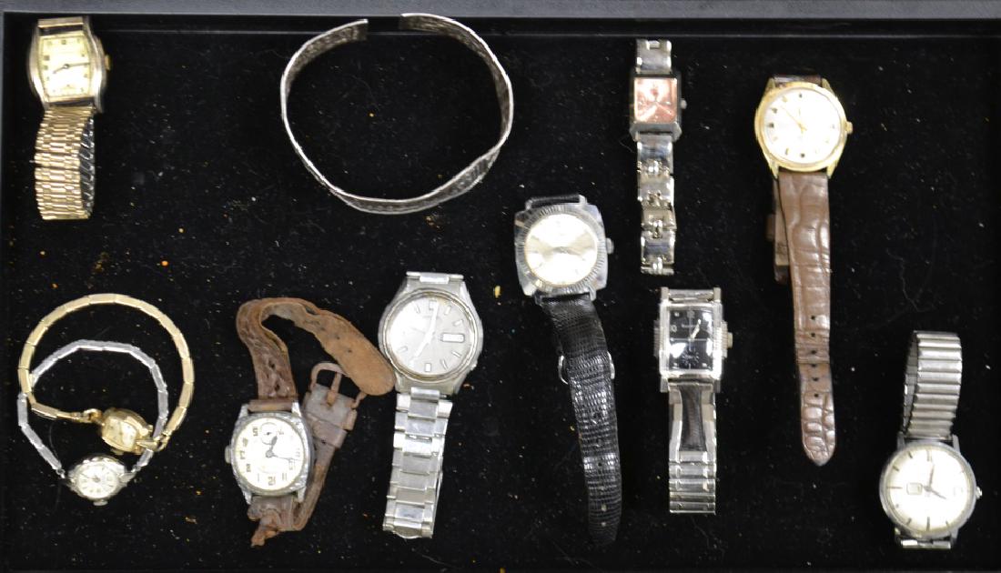Lady's and Men's Watches: Including "Longines" marked "Swiss", a lady's Gruen" marked "Swiss", men's watches including a "Lucerne Deluxe" with a Swiss movement, a "Helbros" with a date and calendar, an "Elgin" sportsman and ot