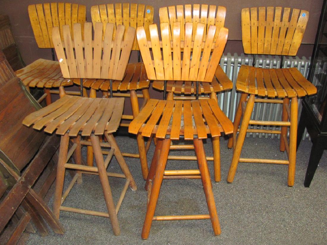 Set of Six Vintage Bar Stools: Each measures approx. 38"h. They are hardwood construction with metal swivel frames.