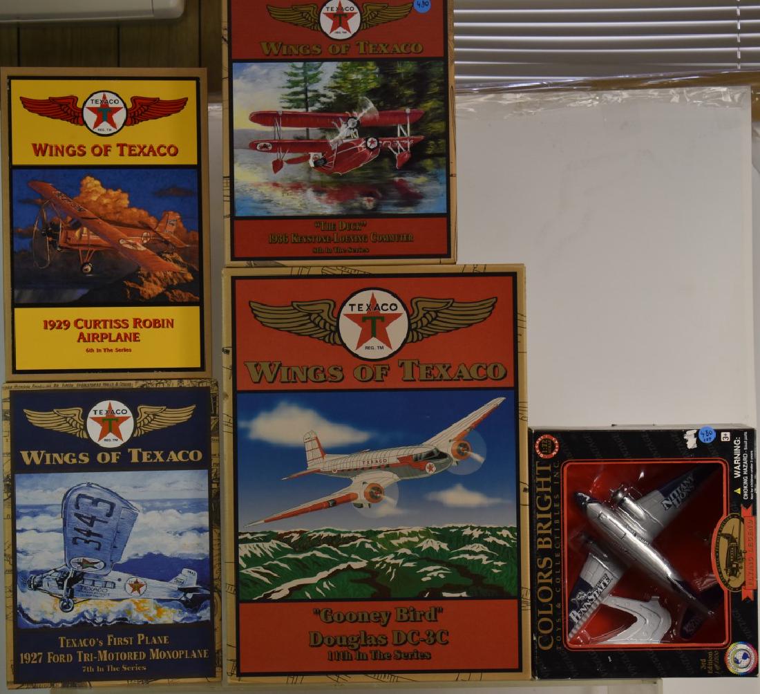Grouping of Die Cast Planes in Boxes: Five pieces - four are "Wings on Texaco" series and one is "Flying Legends of Penn State" plane.