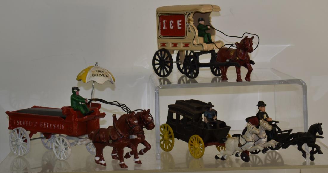 Contemporary Cast Iron Horse Drawn Wagons: Including a "Schultz" beer and ale wagon, an ice wagon and a stage coach.