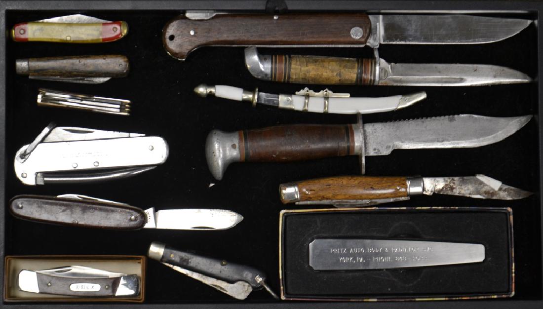 Grouping of Quality Knives: Including a Buck folding knife with original box, a Thorton folding knife with a celluloid case, a large folding knife marked "Stainless Japan" with a wooden handle, a "Camillos New York" folding knif