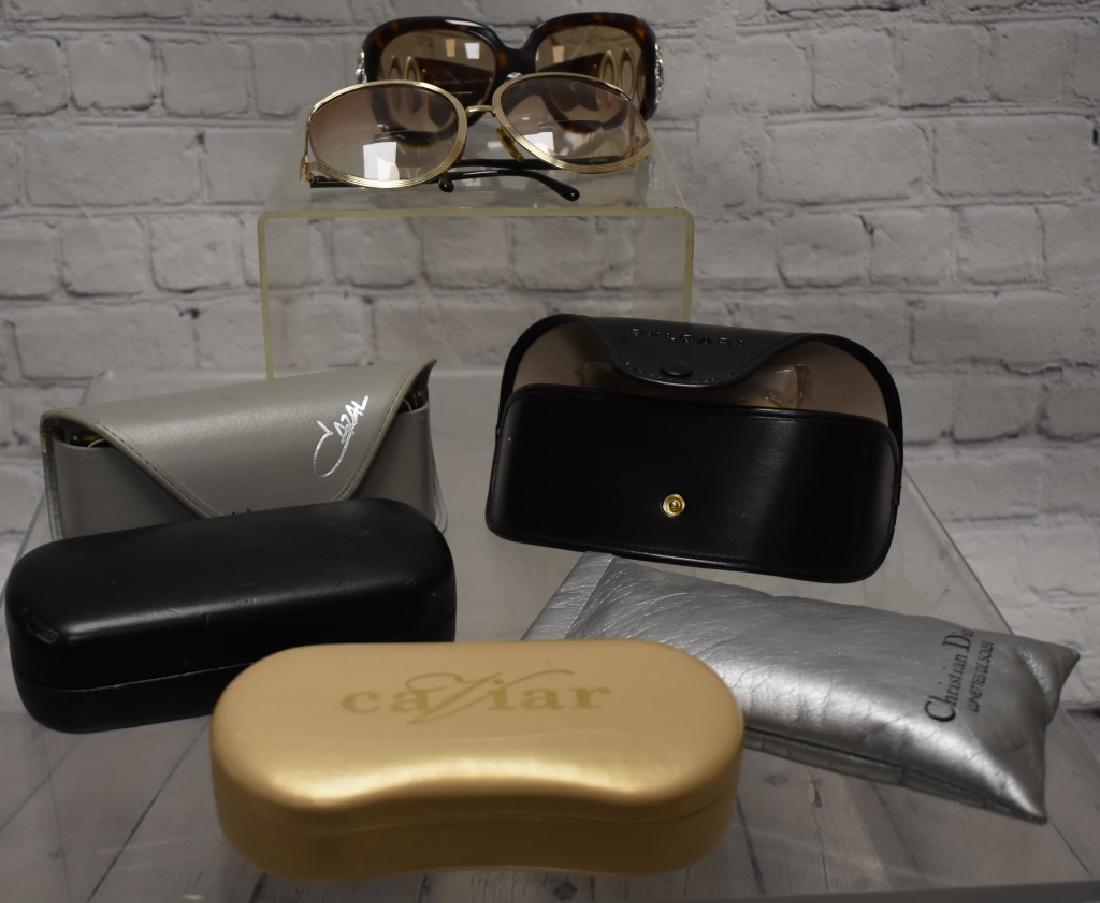 Collection of Designer Eye Glasses: Five Pair of designer eye glasses. Glasses include two pair of Bulgari - one with case, two pair of Christian Dior and one pair of Cazal with case.