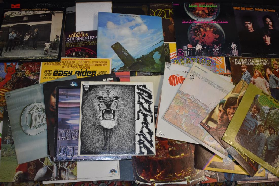 Collection of Vintage Rock and Roll Records: Including Beatles White Album, Beatles Abby Road, two copies of Beatles Magical Mystery Tour, Rolling Stones Through the Past, The Worst of Jefferson Airplane, The Doors, Tommy the Who and various oth