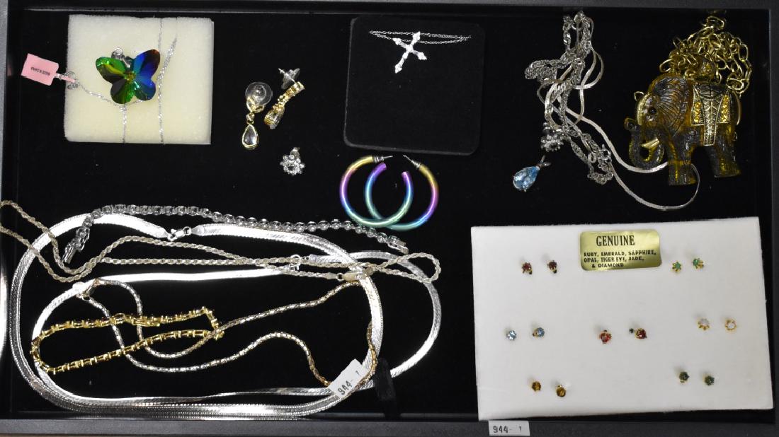 Italian Sterling and other Jewelry: Including two Italian sterling herringbone necklaces, an Italian sterling choker, a gold over sterling bracelet with red stones, stud earrings with semi precious stones and other items.