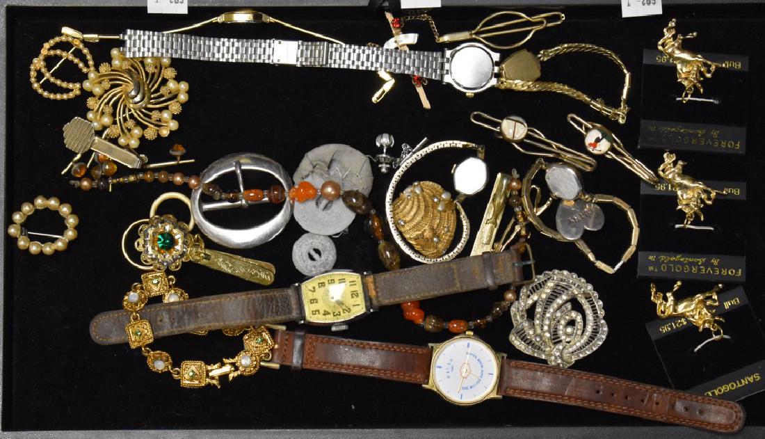Watches and Jewelry: Watches include a vintage Boy Scout watch by "New Haven", a lady's Girard Perregaux watch marked "Swiss", a lady's "Louis" 17 jewel watch, gold tone bracelets and pins and three bull pendants.