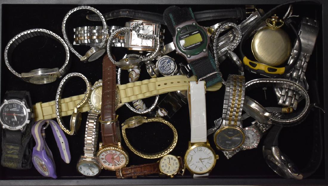 Large Collection of Watches: Including a men's "Truce", a lady's "Geneva", a men's "Joe Boxer", various Times watches and others.