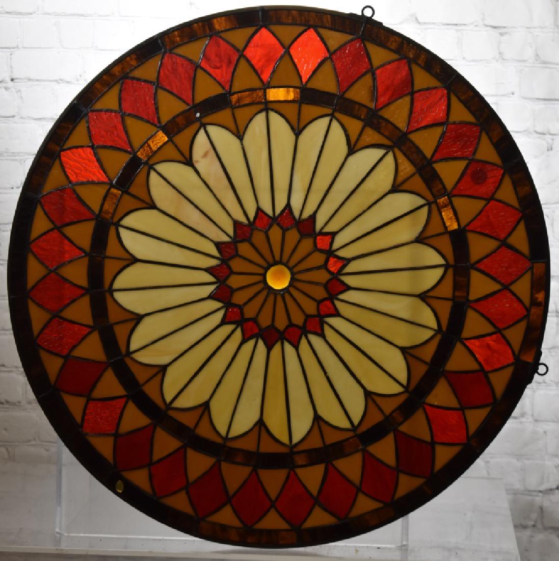 Round Stained Glass Window: Item measures approx. 24" dia. It is a multi colored stained glass window and is a quality contemporary piece.