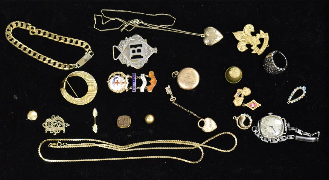 Jewelry and Insignias: Lot includes a gold filled chain, two lockets, various pins and insignias.