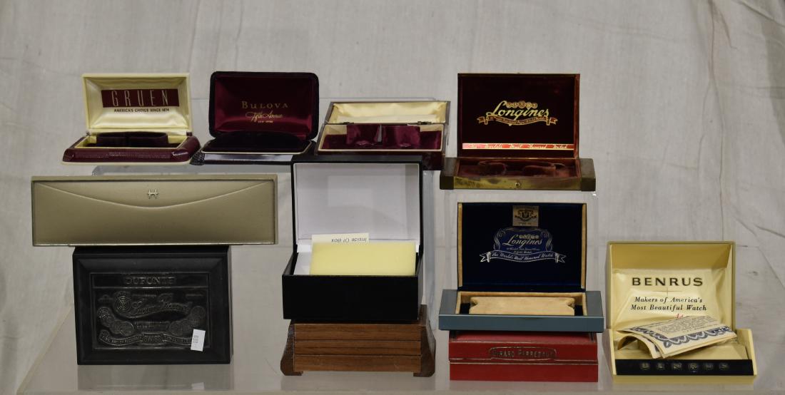 Collection of Vintage Wrist Watch Boxes: Eleven watch boxes including Benrus, Girard Perregaux, Piccard, Gruen and other.