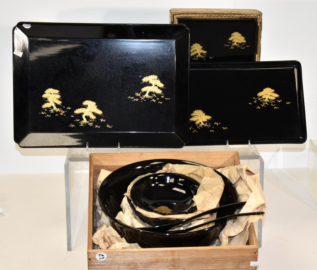 Vintage Japanese Lacquered Salad Set and Trays: Salad bowl measures approx. 10 1/2"dia. It comes with two smaller salad bowls, serving utensils, two serving trays (the larger measuring 14" in length) and a box full of condiment spoons. All are in a