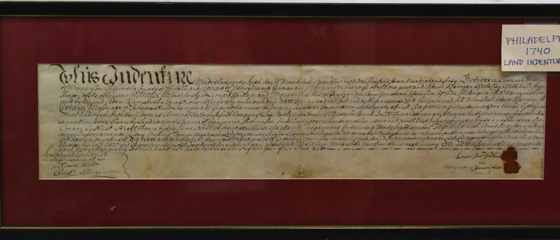 1740 Philadelphia Land Indenture: Exposed area measures approx. 5"h x 22"w. Item is signed by Thomas Shule, Christy Lehmann and two others. It has two wax seals and is a land indenture between Leonard Harherim and Adam Klamper and is