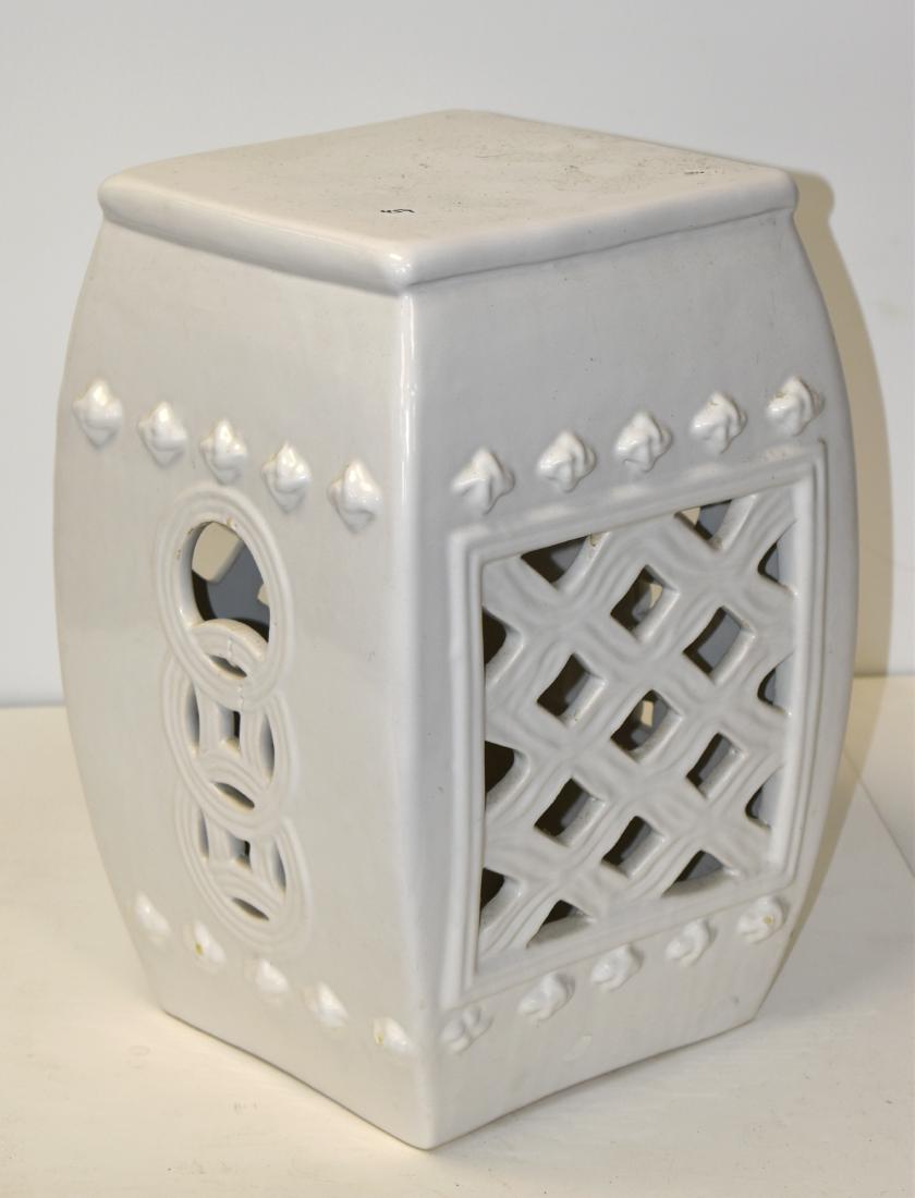 Asian Style Garden Seat Made in Spain: Item measures approx. 18"h x 10" x 10" square across top. It has a white glaze, a reticulated body and is marked "Spain". Note: Item has several glaze pops on accents near base.