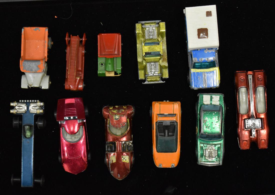 Hot Wheels Red Line and Lesney Vehicles: Eight Red Line hot wheels and three Lesneys.