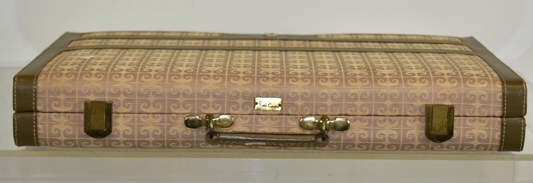 Vintage Backgammon Set in Case: Item has a cloth and leather case and appears to be complete with 2 sets of dice, 30 pieces, and a multiplier. Condition is good.