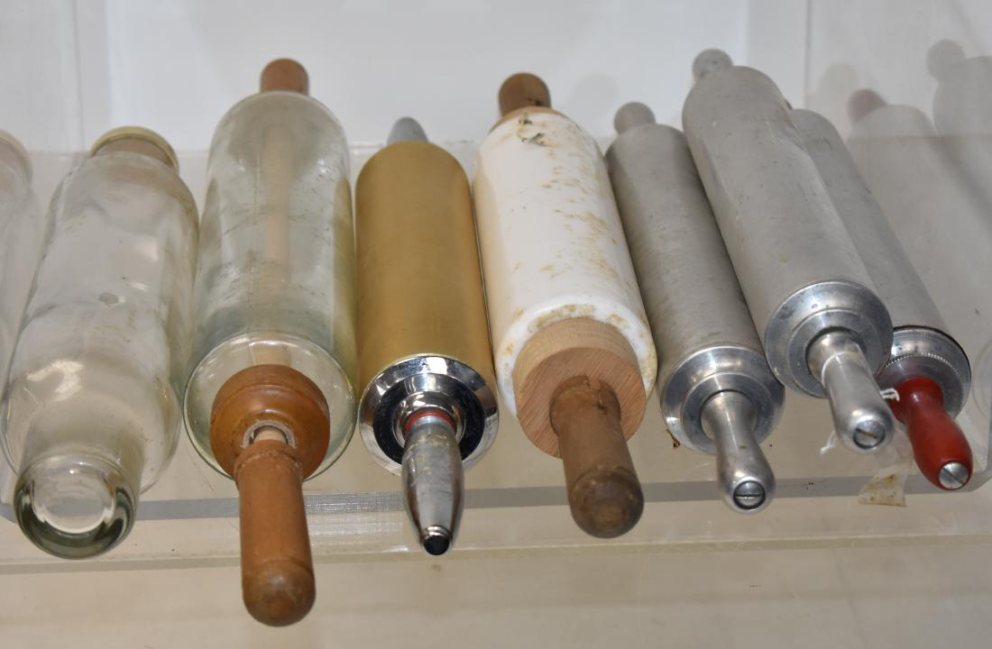 Group of Vintage Rolling Pins: Largest measures approx. 21" in length. Three are glass, one with original "Roll-Rite Cap" and four are aluminum.