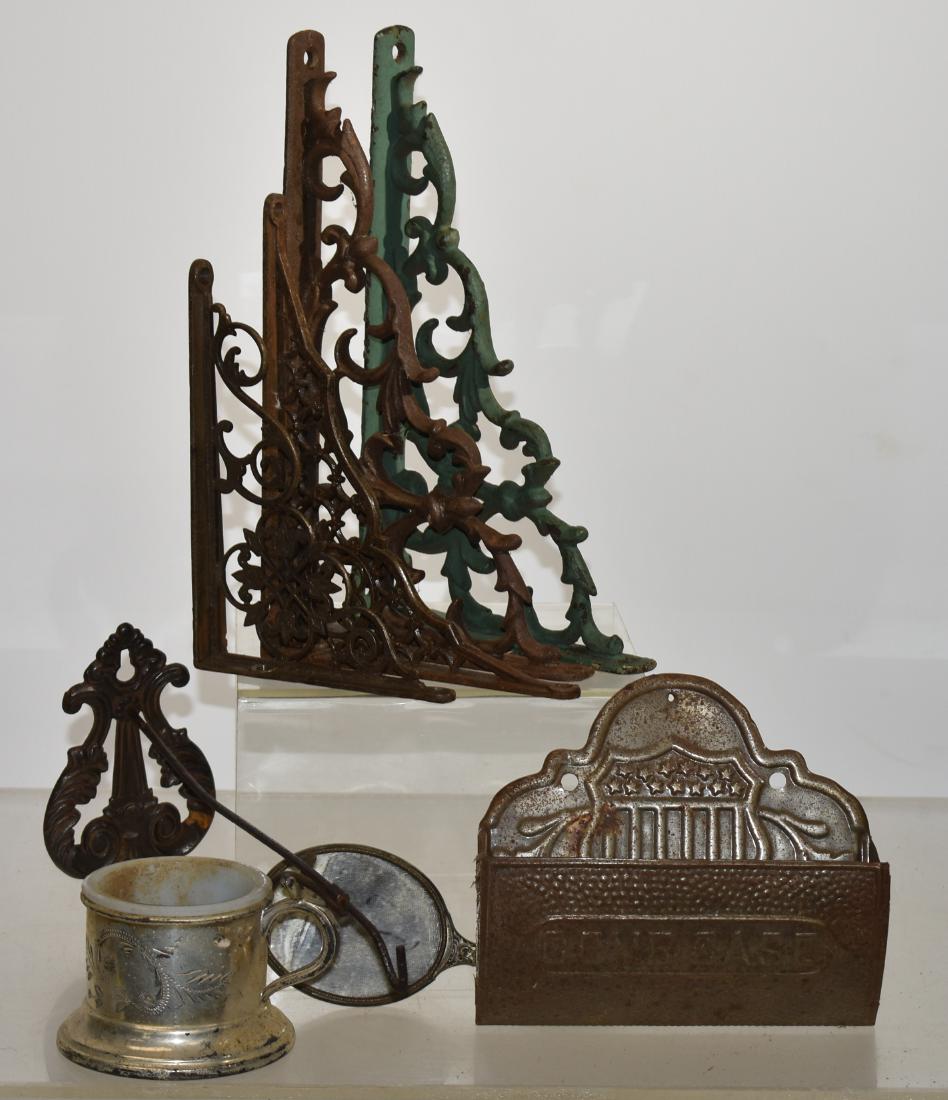 Victorian Shelf Brackets and more: Five singular brackets the largest measuring 10" in length, a hanging receipt hook and a Civil War era comb case. All items show oxidation.