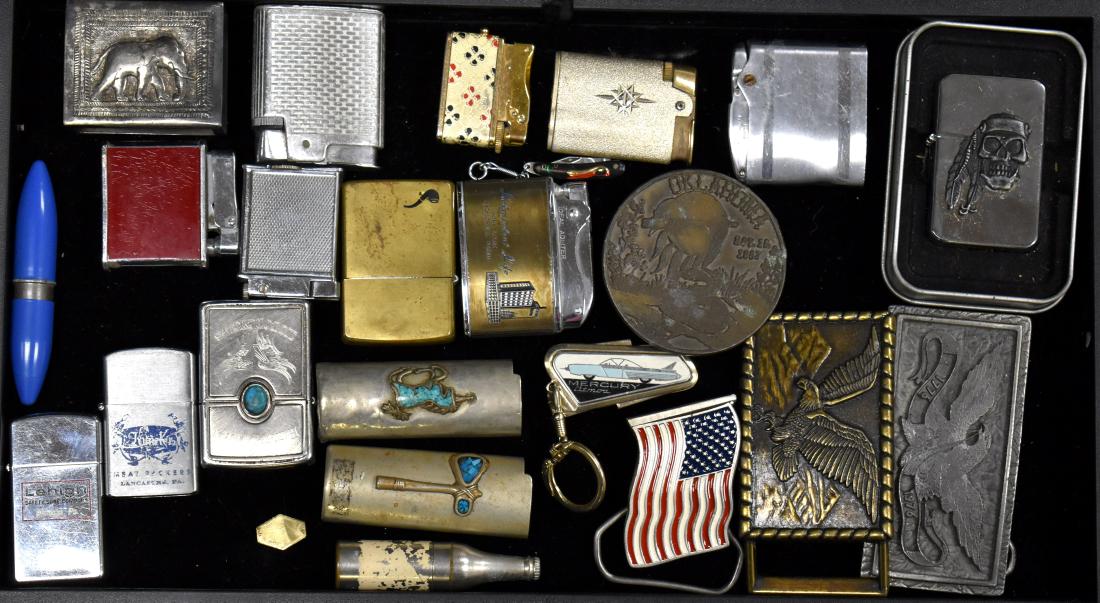 Lighters and Belt Buckles: Including a Harley Davidson Zippo with a turquoise stone, a lighter with a Native American skull , a Zippo with a brass case, iodized lighters, four belt buckles and other items.