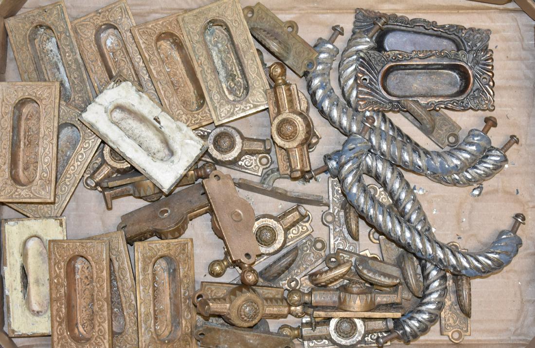 Victorian Brass Hardware Collection: Including a set of ten brass inset cupboard handles, twelve ornate latches with hooks made by "Hopkins & Dickinson NY" and four later chrome dresser handles.